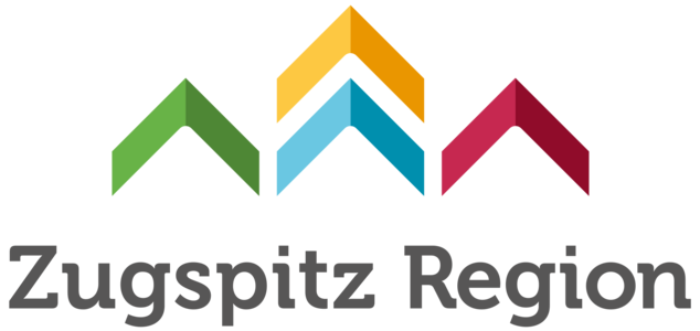 Abbildung Logo bunte Pfeile mit der Beschriftung der Zugspitz Region