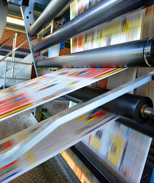 Abbildung Maschine die Zeitungen abdruckt