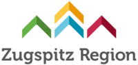 Abbildung Logo bunte Pfeile mit der Beschriftung der Zugspitz Region